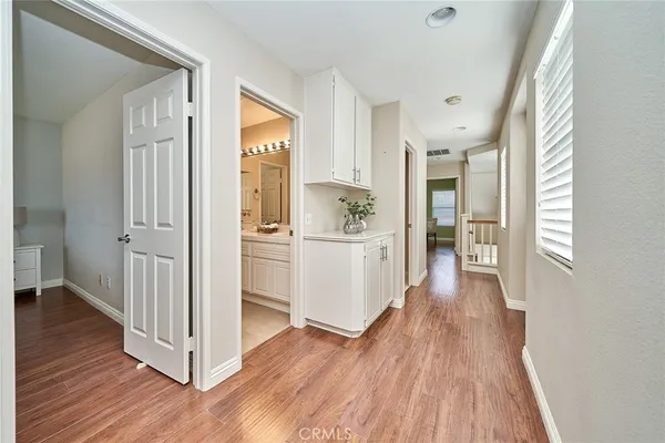 a view of a room that has a table and chair