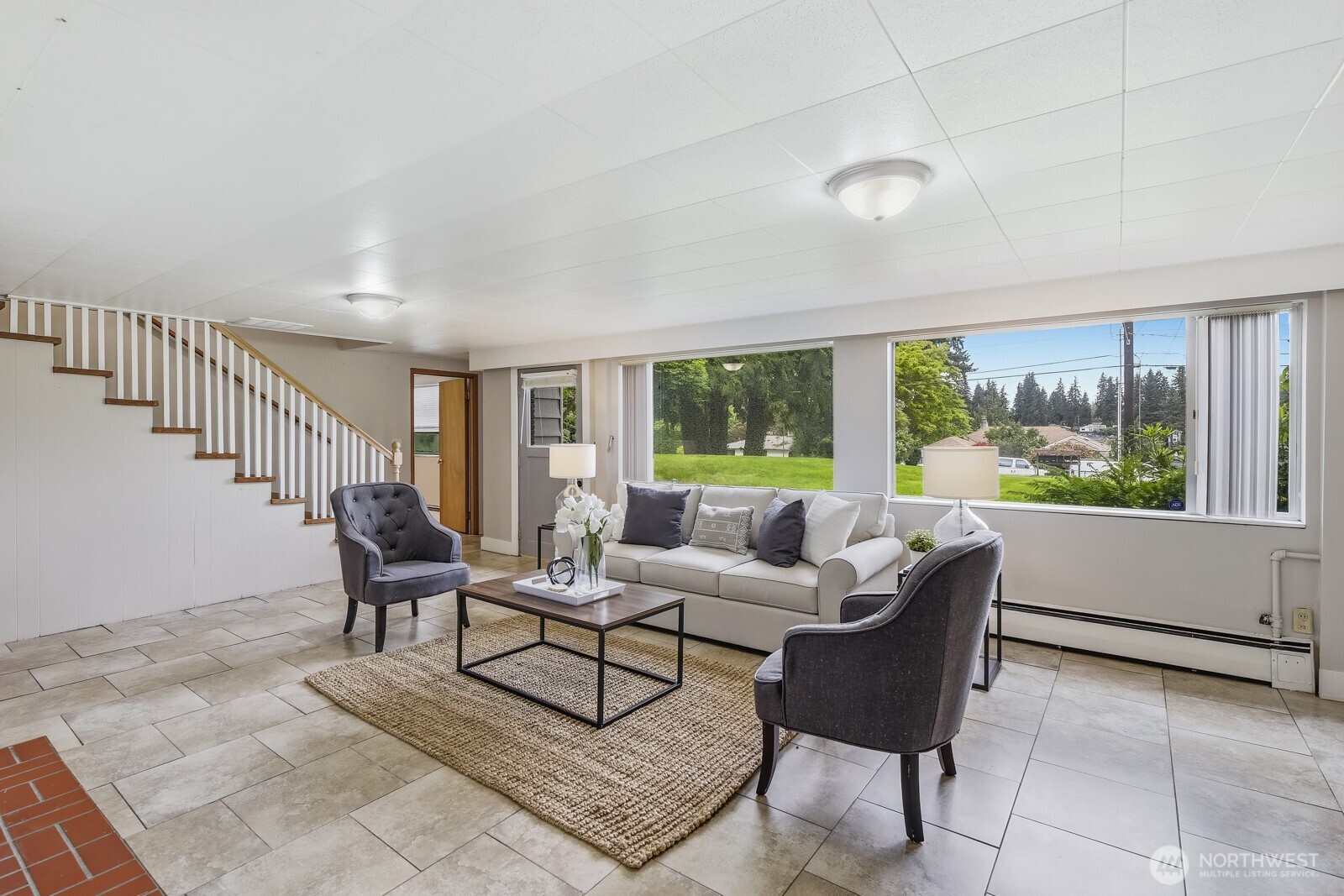 3822 Shelby Road Lynnwood, WA 98087 - Photo 25 of 40 a living room with furniture and a large window