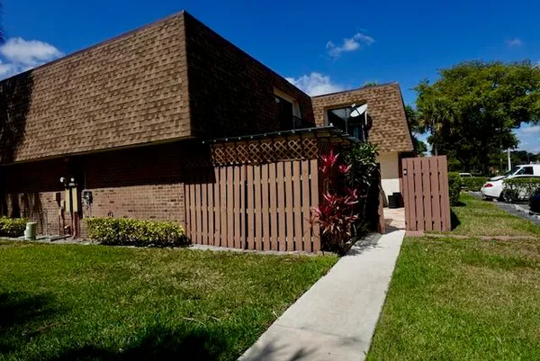 a view of a back yard of the house