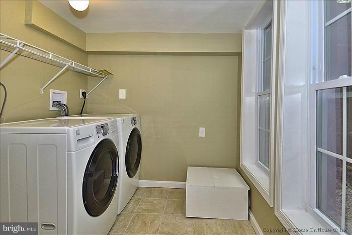 10302 Ridgemoor Drive Silver Spring, MD 20901 - Photo 9 of 16 a utility room with dryer and washer