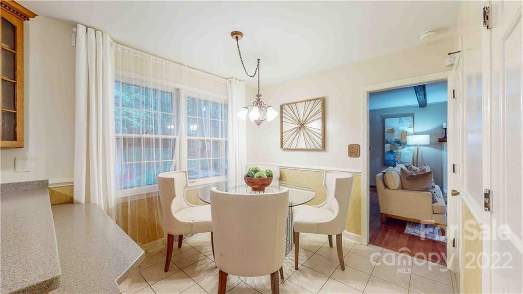 6620 Fairlawn Road Charlotte, NC 28215 - Photo 19 of 43 a dining room with furniture and window