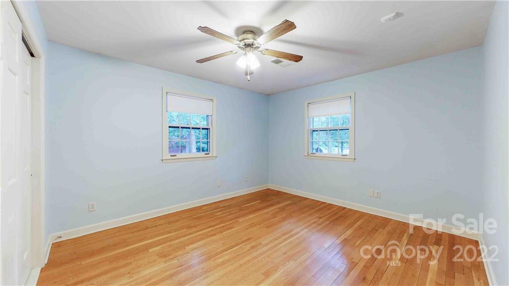 6620 Fairlawn Road Charlotte, NC 28215 - Photo 36 of 43 a view of empty room with wooden floor