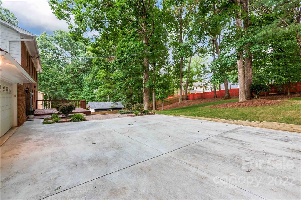 6620 Fairlawn Road Charlotte, NC 28215 - Photo 4 of 43 a view of street with parked cars