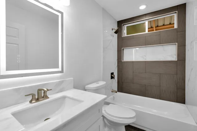 a view of a kitchen with a sink and dish washer