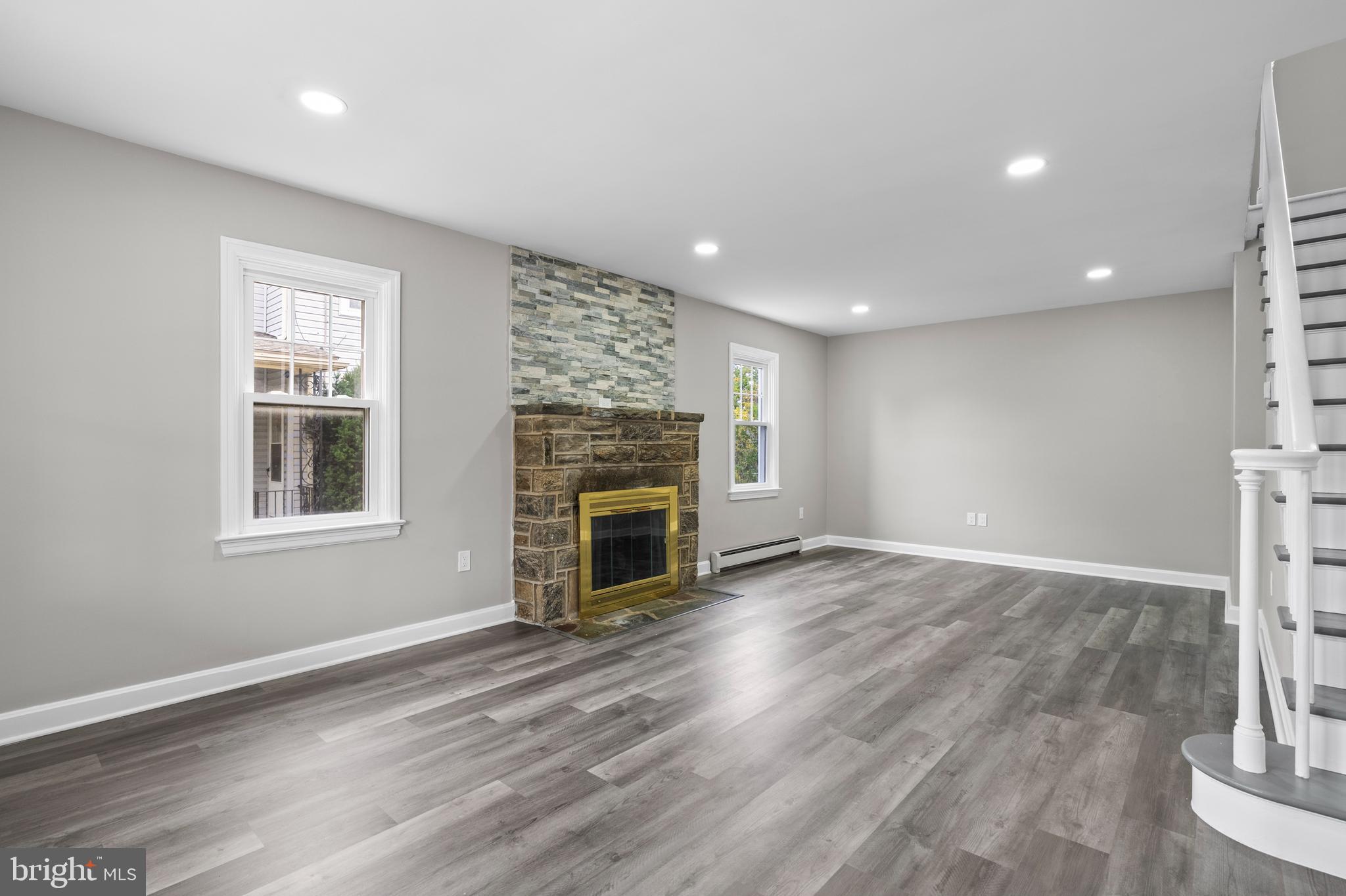 131 Lippincott Avenue Riverside, NJ 08075 - Photo 3 of 34 an empty room with windows and fireplace