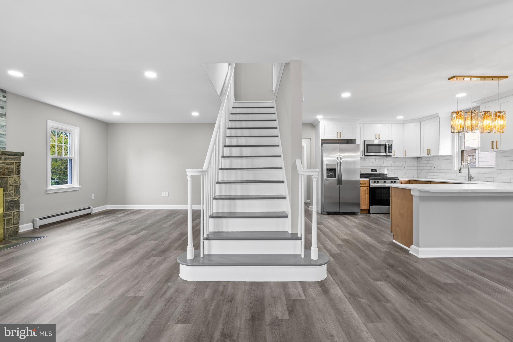 131 Lippincott Avenue Riverside, NJ 08075 - Photo 6 of 34 a view of kitchen with sink microwave and refrigerator