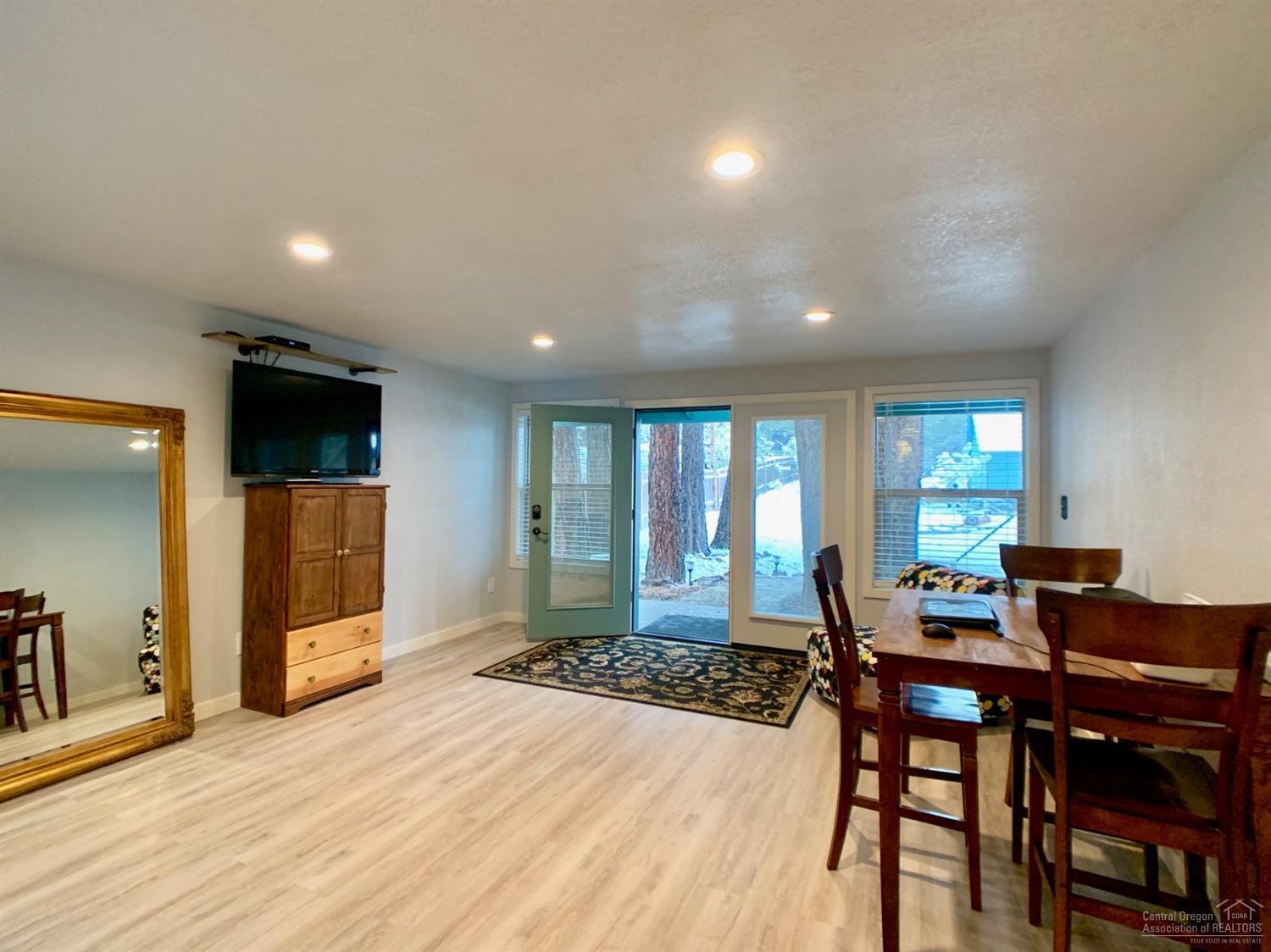 60281 Cheyenne Road Bend, OR 97702 - Photo 22 of 25 Studio main area with french doors, natu