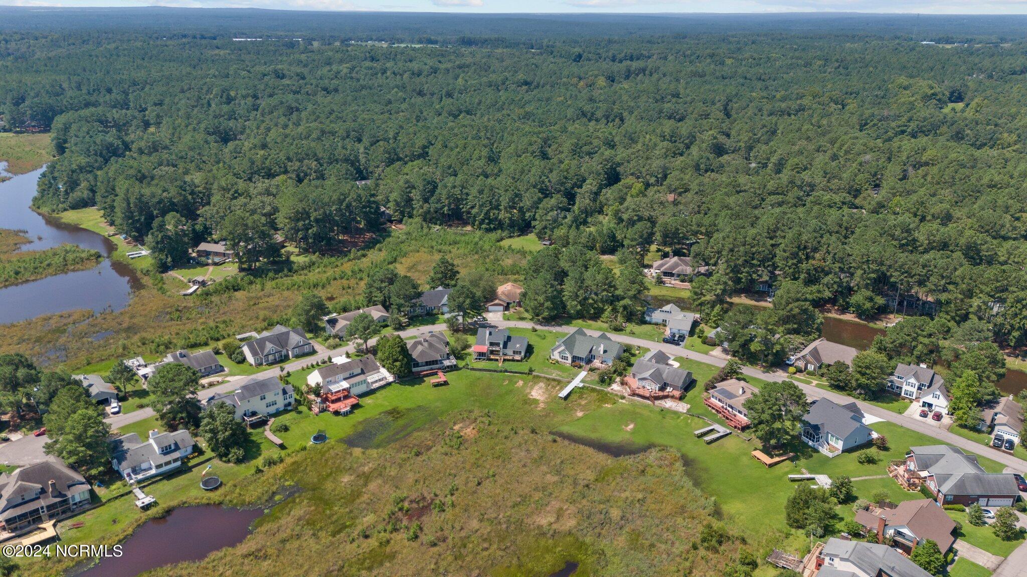 678 Cedar Point Vass, NC 28394 - Photo 4 of 47 3-web-or-mls-DJI_20240810115925_0054_D