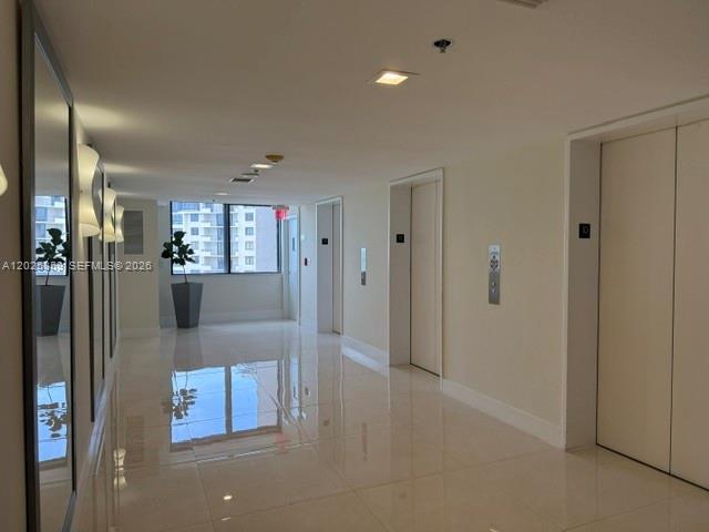 540 Brickell Key Drive, Unit 1024 Miami, FL 33131 - Photo 13 of 28 a view of a kitchen and a refrigerator