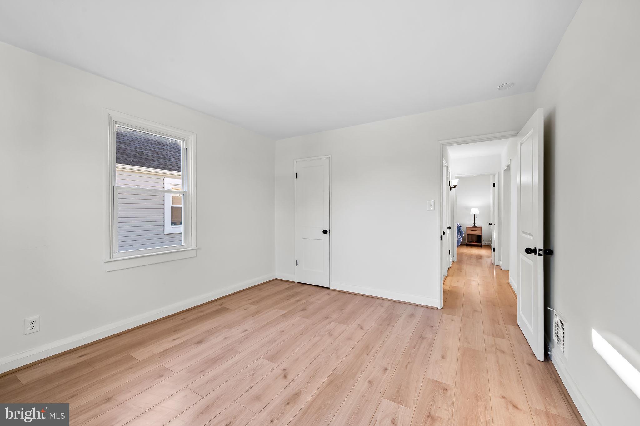2511 Wentworth Road Baltimore, MD 21234 - Photo 13 of 24 a view of a room with wooden floor and a window