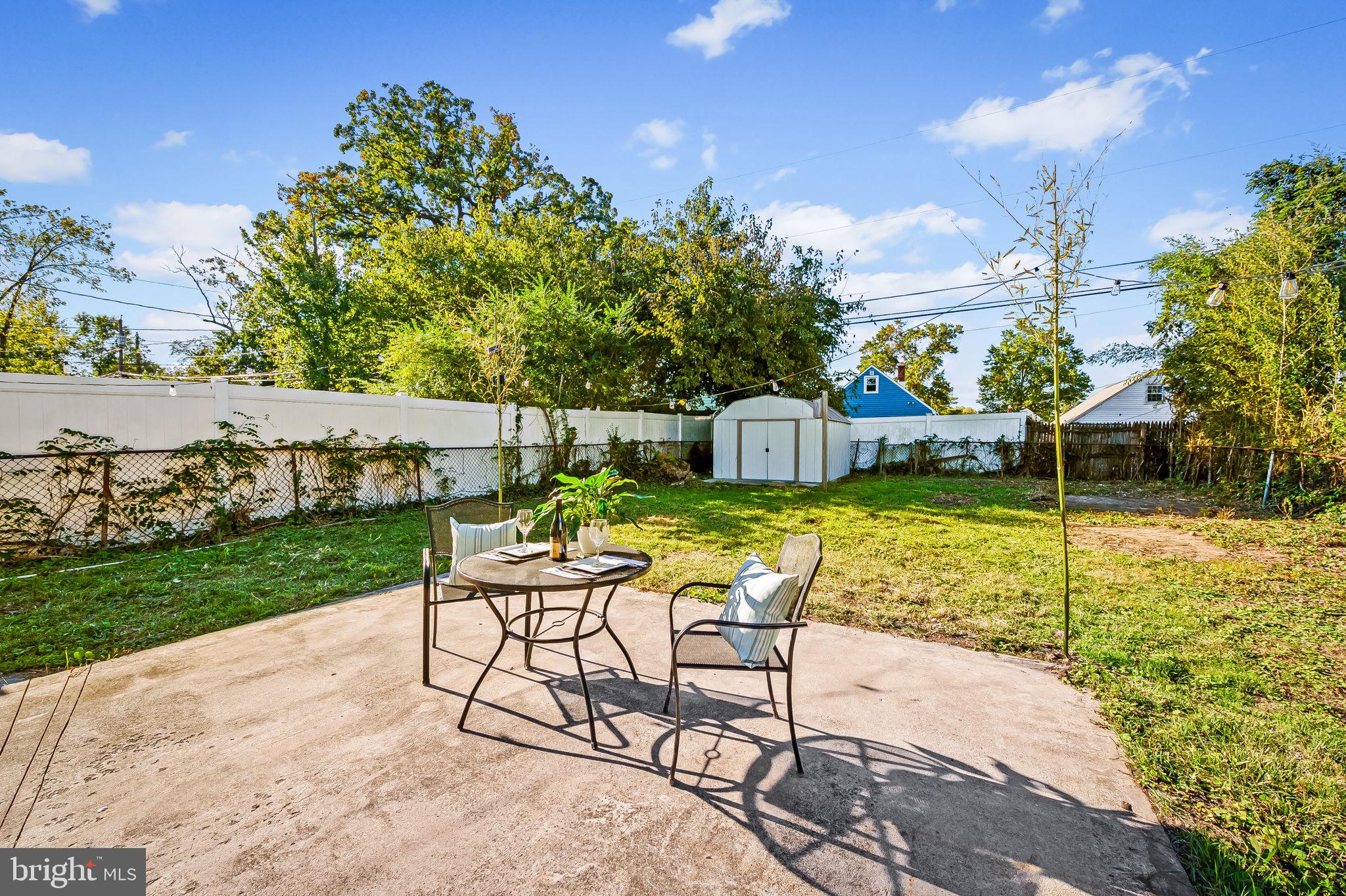 2511 Wentworth Road Baltimore, MD 21234 - Photo 24 of 24 a view of a chairs and table on the garden