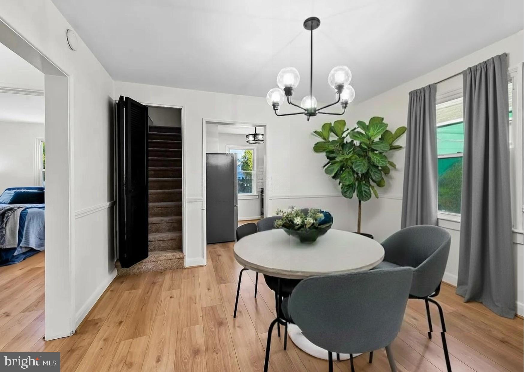 2511 Wentworth Road Baltimore, MD 21234 - Photo 6 of 24 a view of a dining room with furniture window and wooden floor
