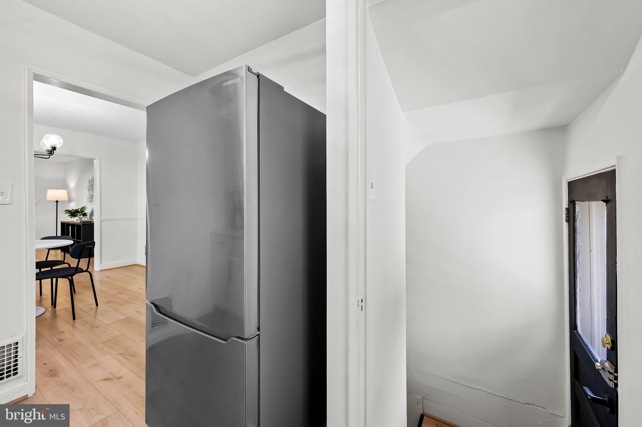 2511 Wentworth Road Baltimore, MD 21234 - Photo 8 of 24 a view of a kitchen from the hallway