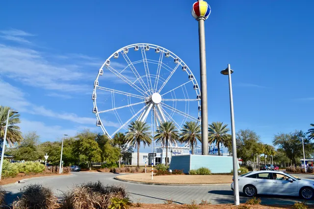 a view of a street with cars