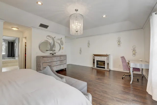 a bathroom with a double vanity sink and mirror