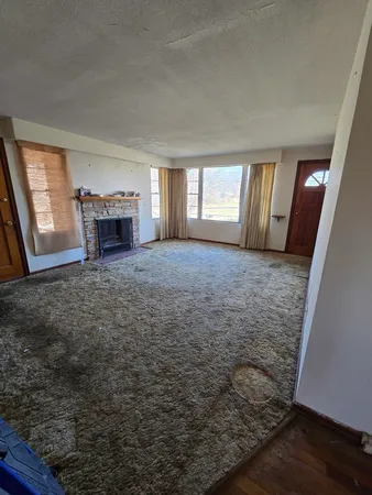 an empty room with windows