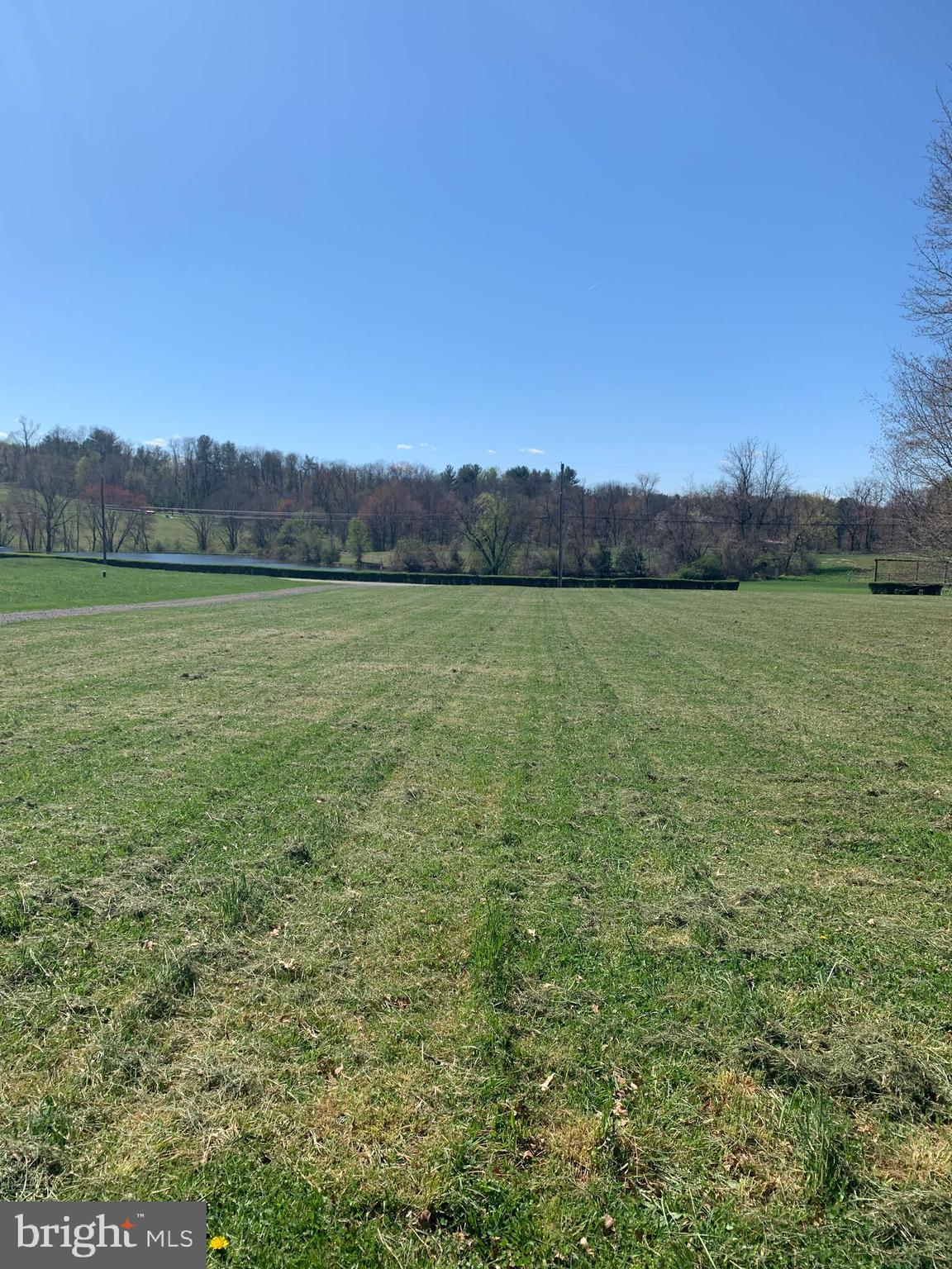 80 Bertolet School Road Spring City, PA 19475 - Photo 2 of 3 View from the front of the yard, large pond