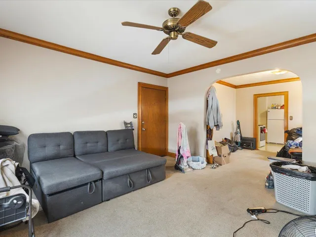 a view of a hallway with windows
