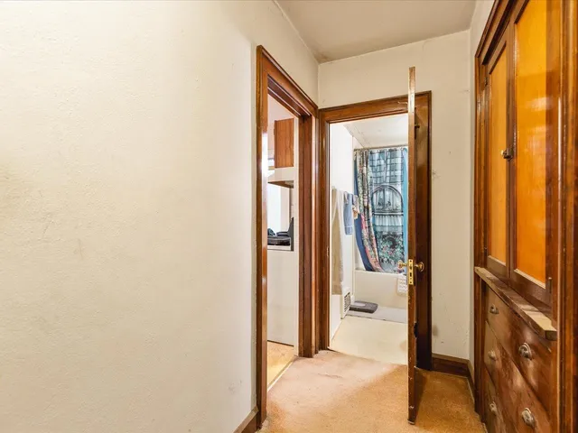 a view of a bathroom with a glass door