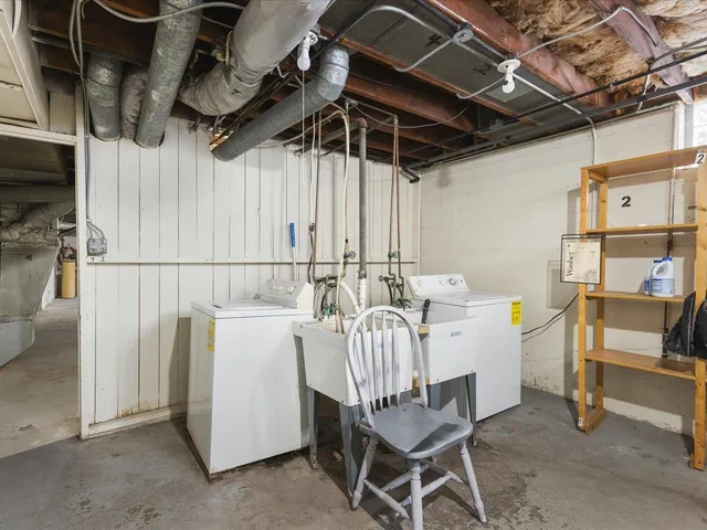 a view of a backyard with sitting area