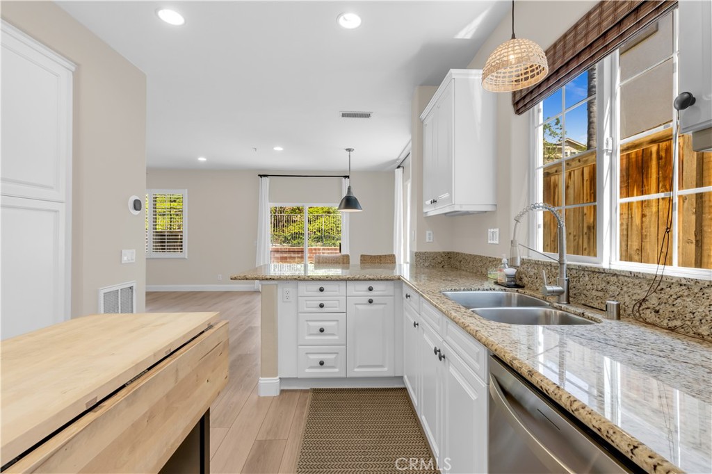 9 Fieldhouse Ladera Ranch, CA 92694 - Photo 8 of 33 Plenty of cabinets, stone counters, stainless steel appliances