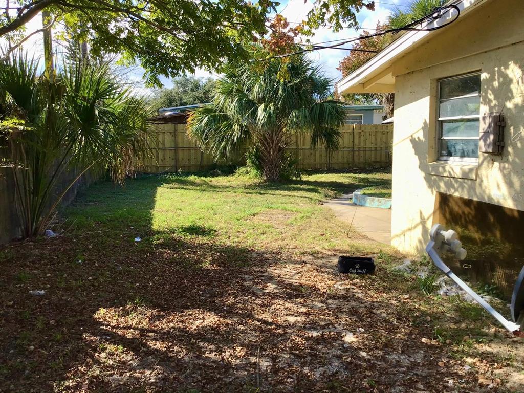 854 Derbyshire Road Daytona Beach, FL 32117 - Photo 11 of 12 a front view of a house with a yard