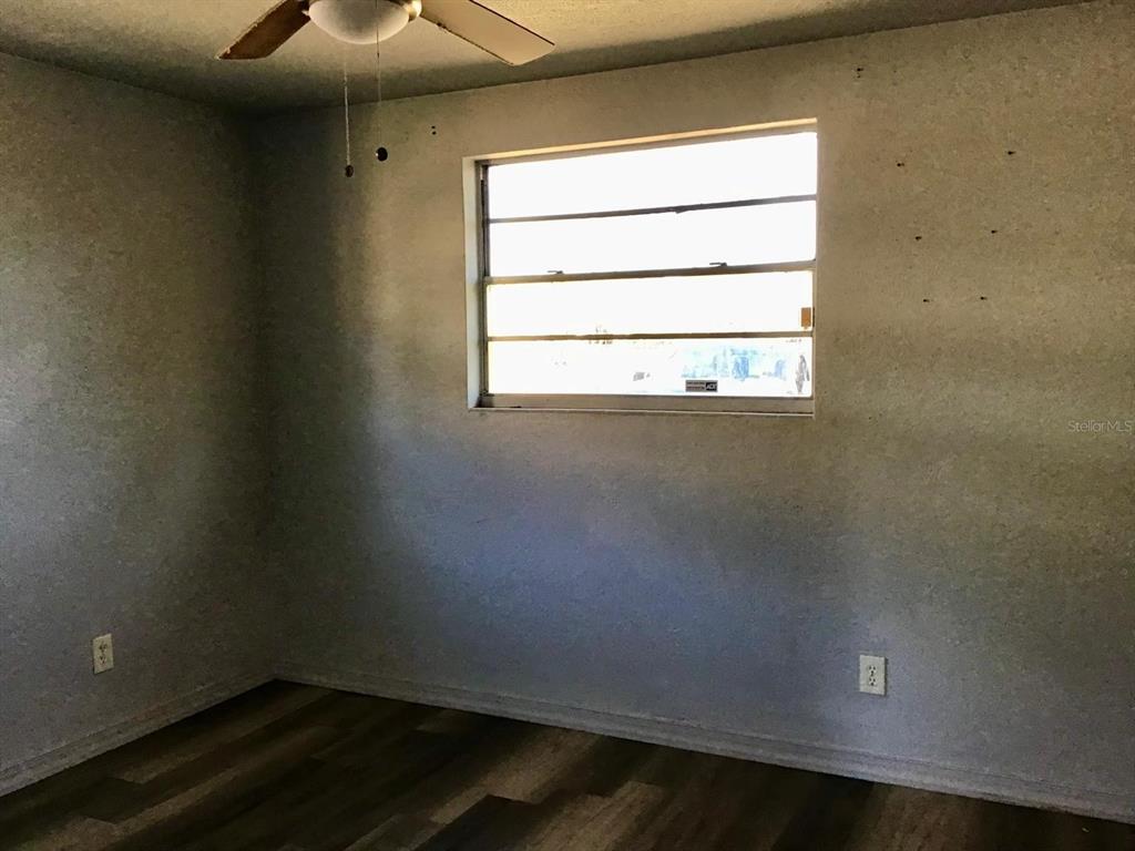 854 Derbyshire Road Daytona Beach, FL 32117 - Photo 6 of 12 a view of a small space with a window