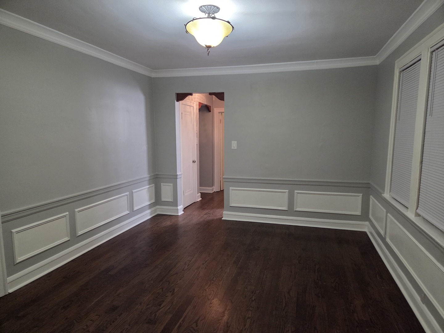5653 North Spaulding Avenue, Unit 2E Chicago, IL 60659 - Photo 3 of 8 wooden floor in an empty room