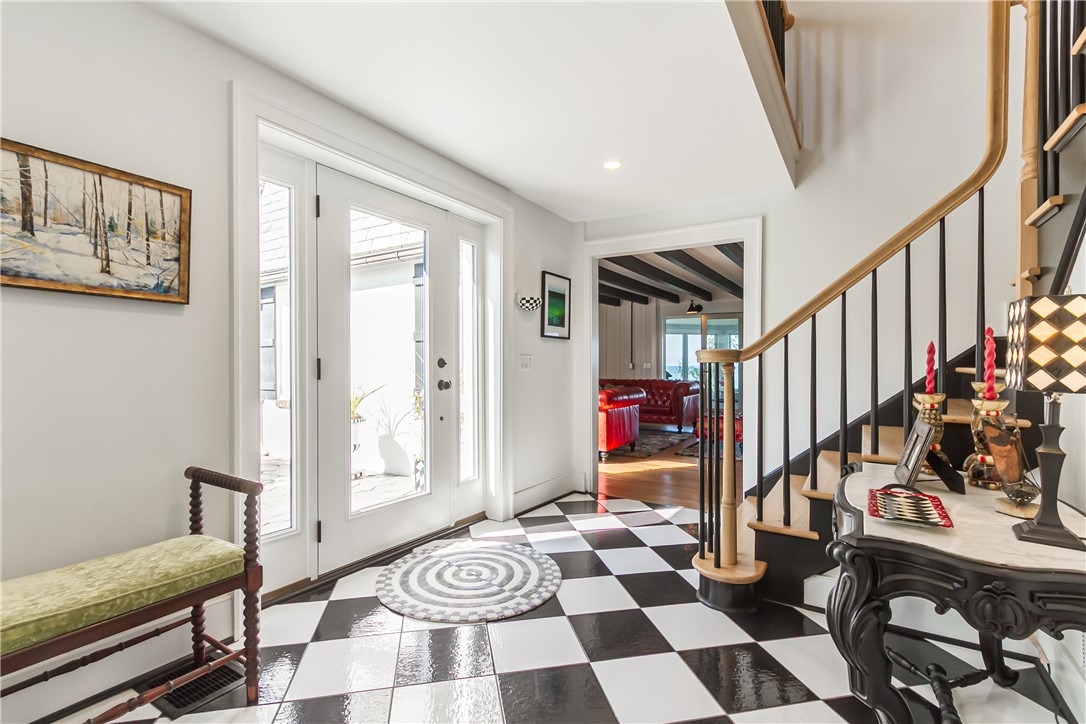 3079 Lake Road Williamson, NY 14589 - Photo 13 of 50 STUNNING TWO STORY FOYER WITH BEAUTIFUL STAIRCASE