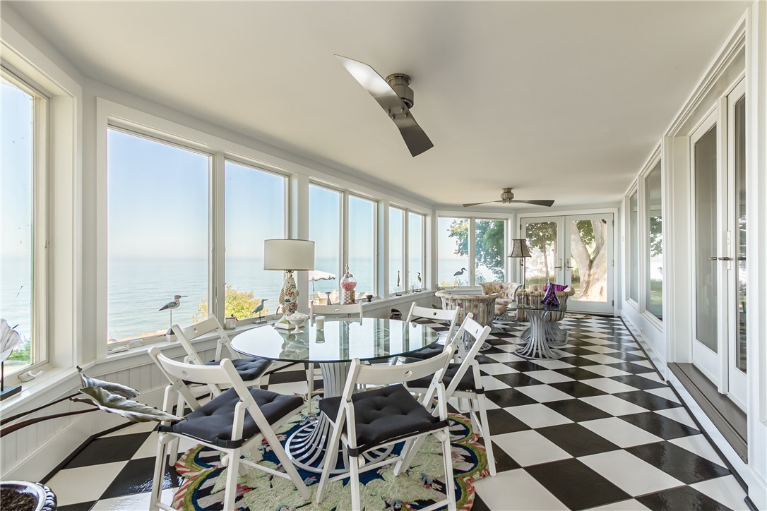 3079 Lake Road Williamson, NY 14589 - Photo 19 of 50 ULTIMATE WALL OF GLASS SUNROOM WITH HEATED TILE FL