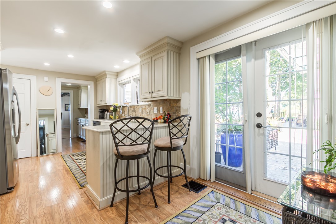 3079 Lake Road Williamson, NY 14589 - Photo 23 of 50 DESIGNER COOK'S KITCHEN WITH BEAUTIFUL CABINETRY,