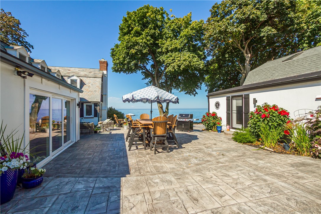 3079 Lake Road Williamson, NY 14589 - Photo 34 of 50 ULTIMATE LAKEVIEW COURTYARD WITH FIREPLACE....GREA