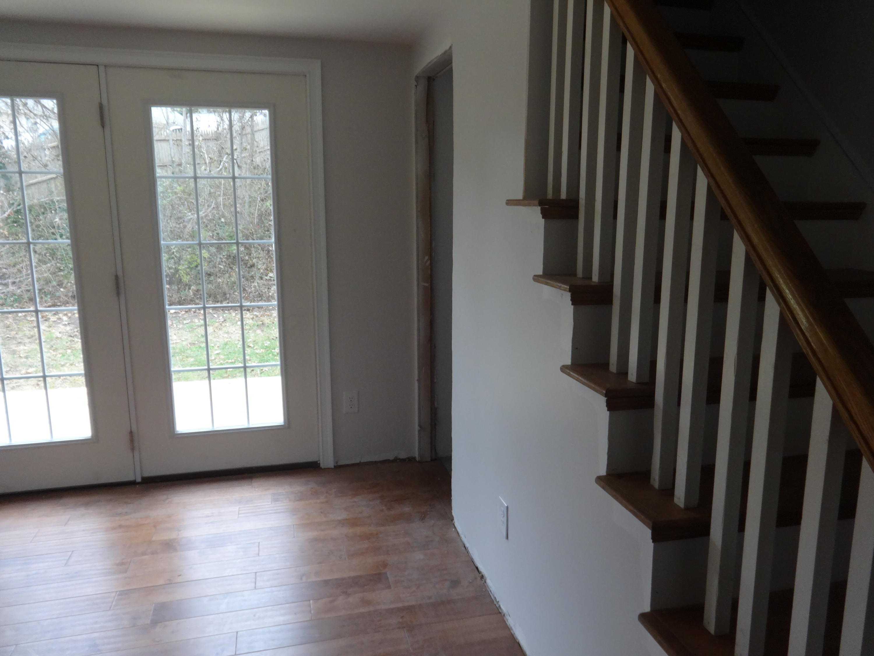 15 Cliff Road Monument Beach, MA 02532 - Photo 13 of 28 a view of an empty room with wooden floor and a window