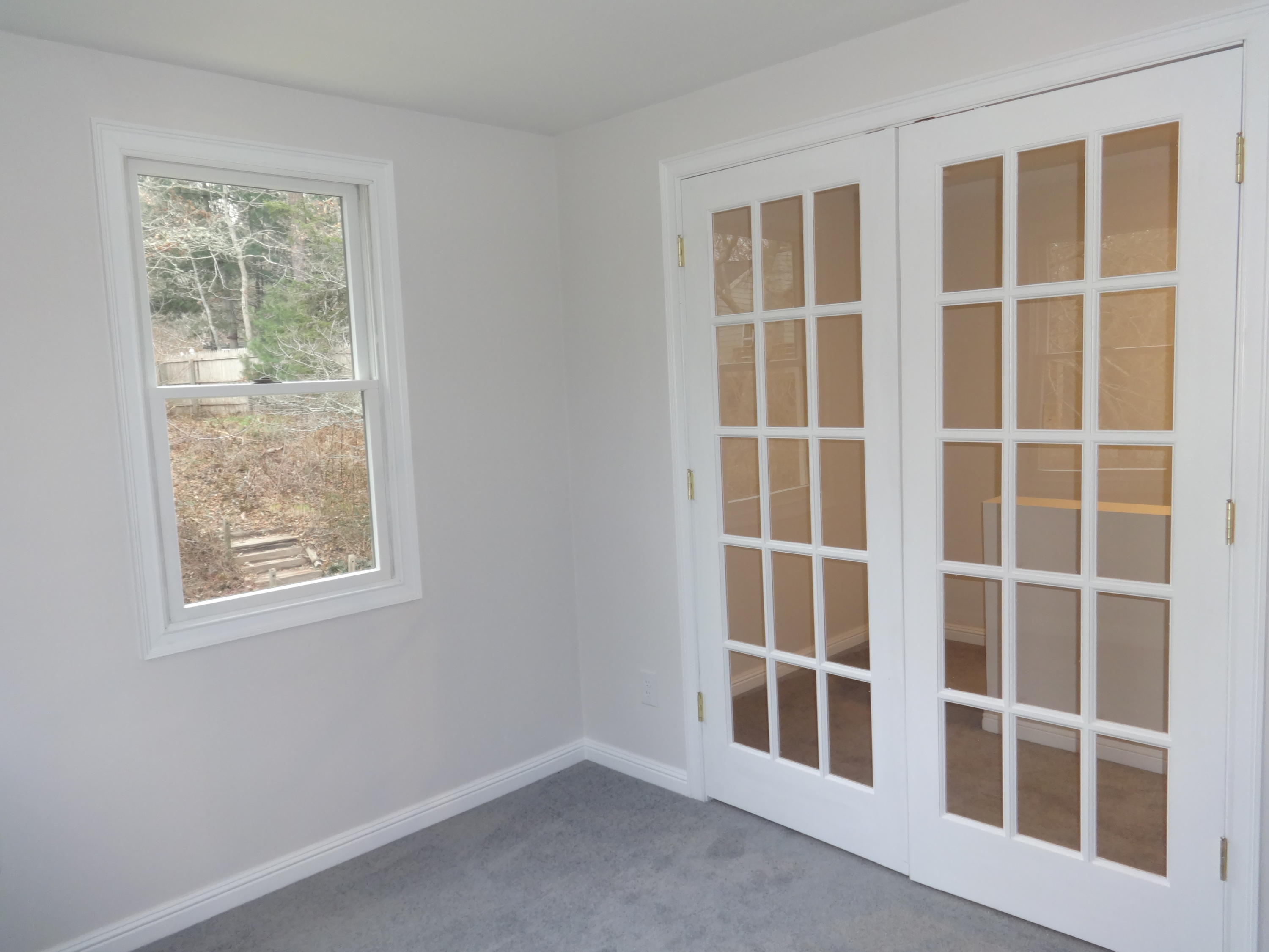 15 Cliff Road Monument Beach, MA 02532 - Photo 18 of 28 a view of an empty room with a window