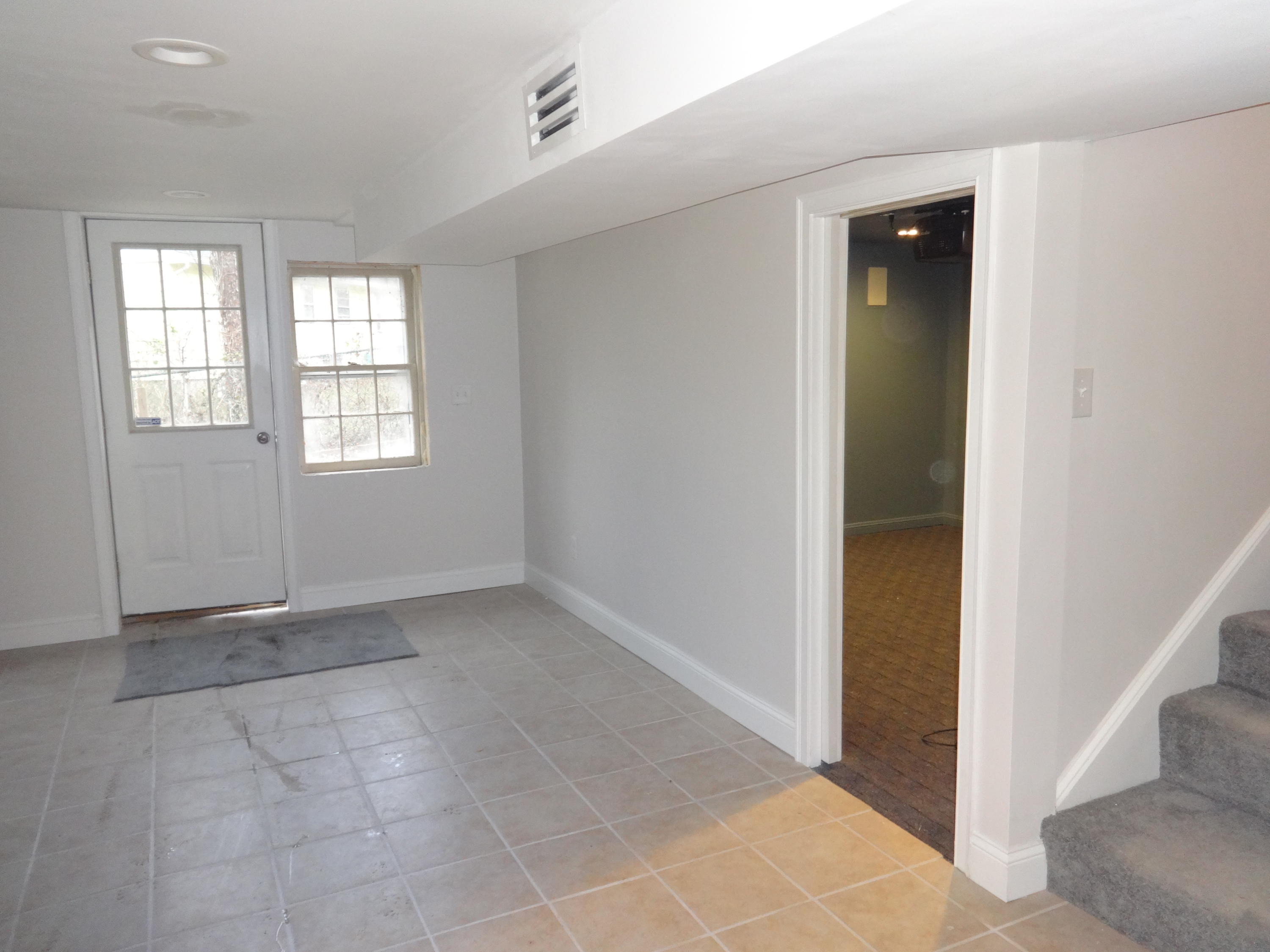 15 Cliff Road Monument Beach, MA 02532 - Photo 23 of 28 an empty room with windows and closet