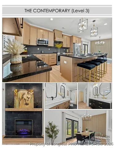 a kitchen with stainless steel appliances granite countertop a stove and cabinets