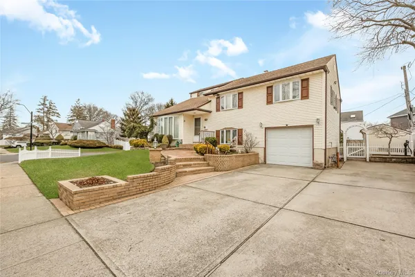 a view of swimming pool with outdoor seating and yard