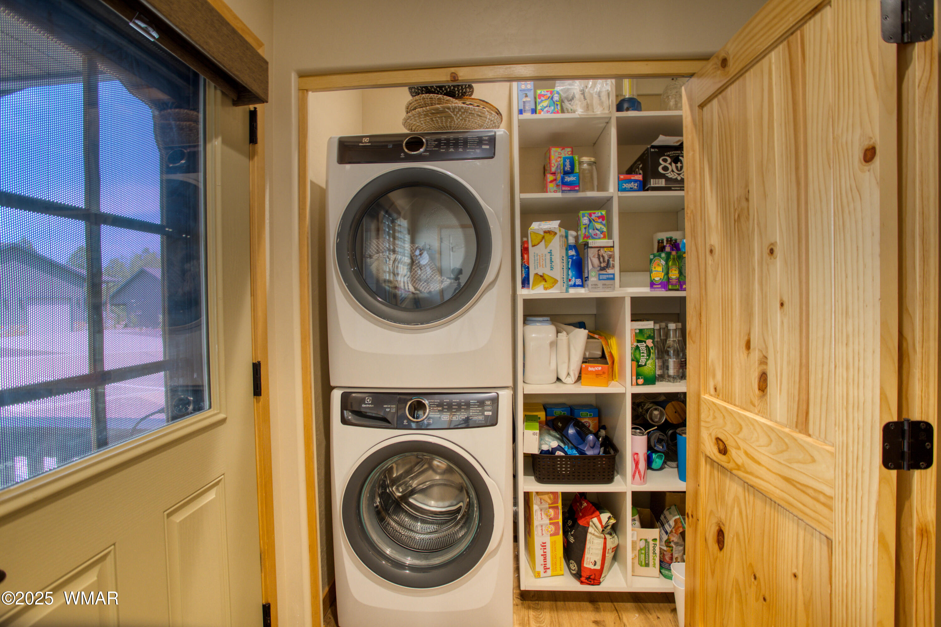 5863 Apollo Way Lakeside, AZ 85929 - Photo 12 of 16 a utility room with dryer and washer