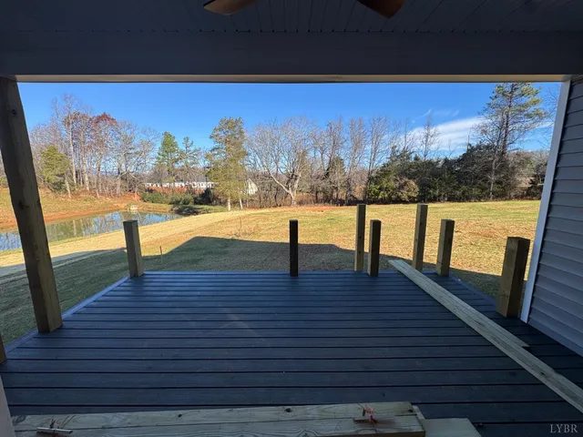 a view of a hallway with wooden walls