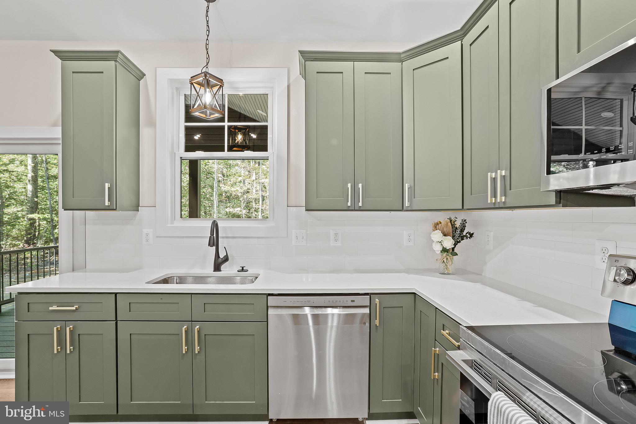 195 North Glebe Road Montross, VA 22520 - Photo 16 of 53 a kitchen with a sink cabinets and window
