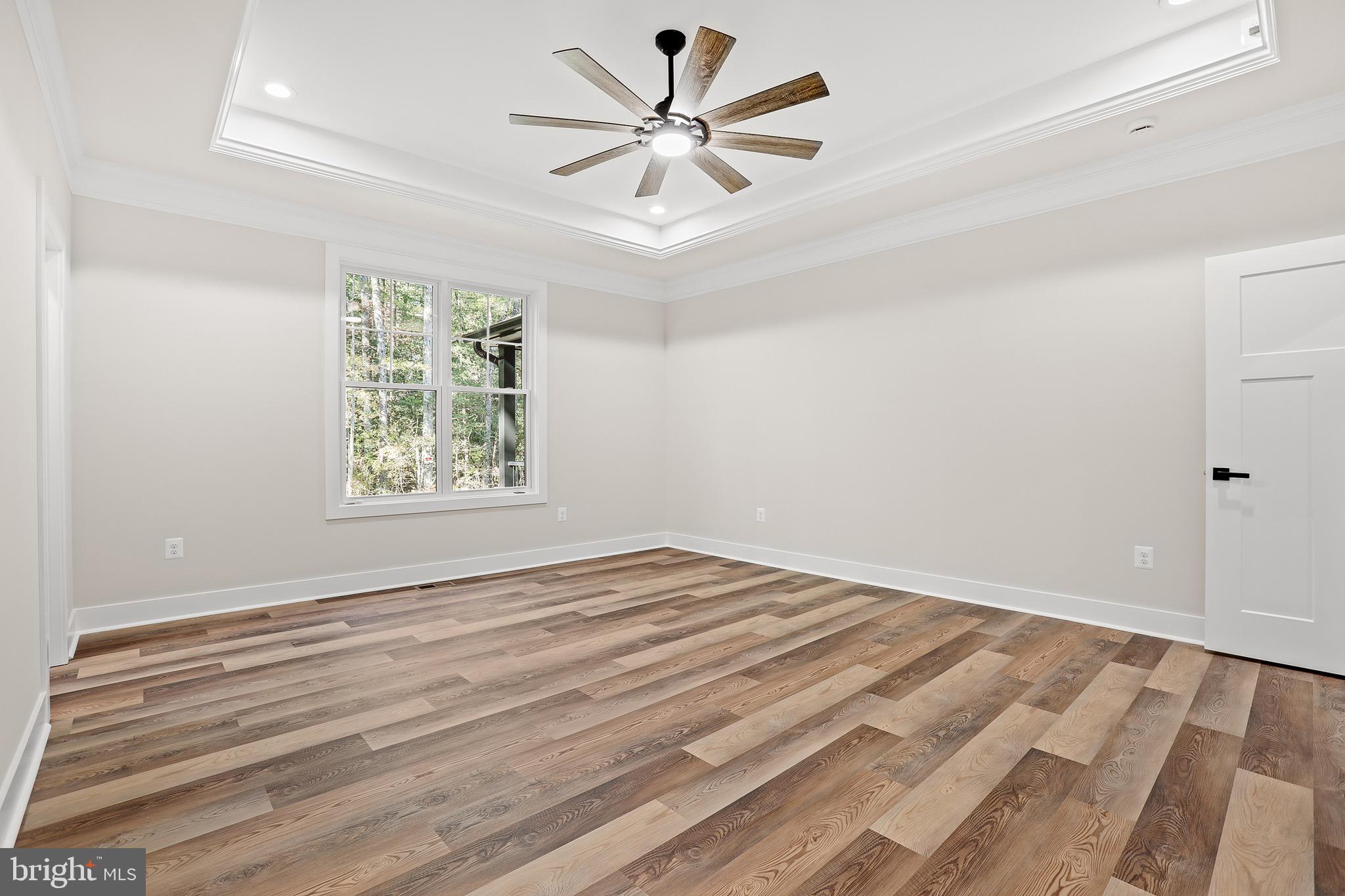 195 North Glebe Road Montross, VA 22520 - Photo 22 of 53 an empty room with windows and fan