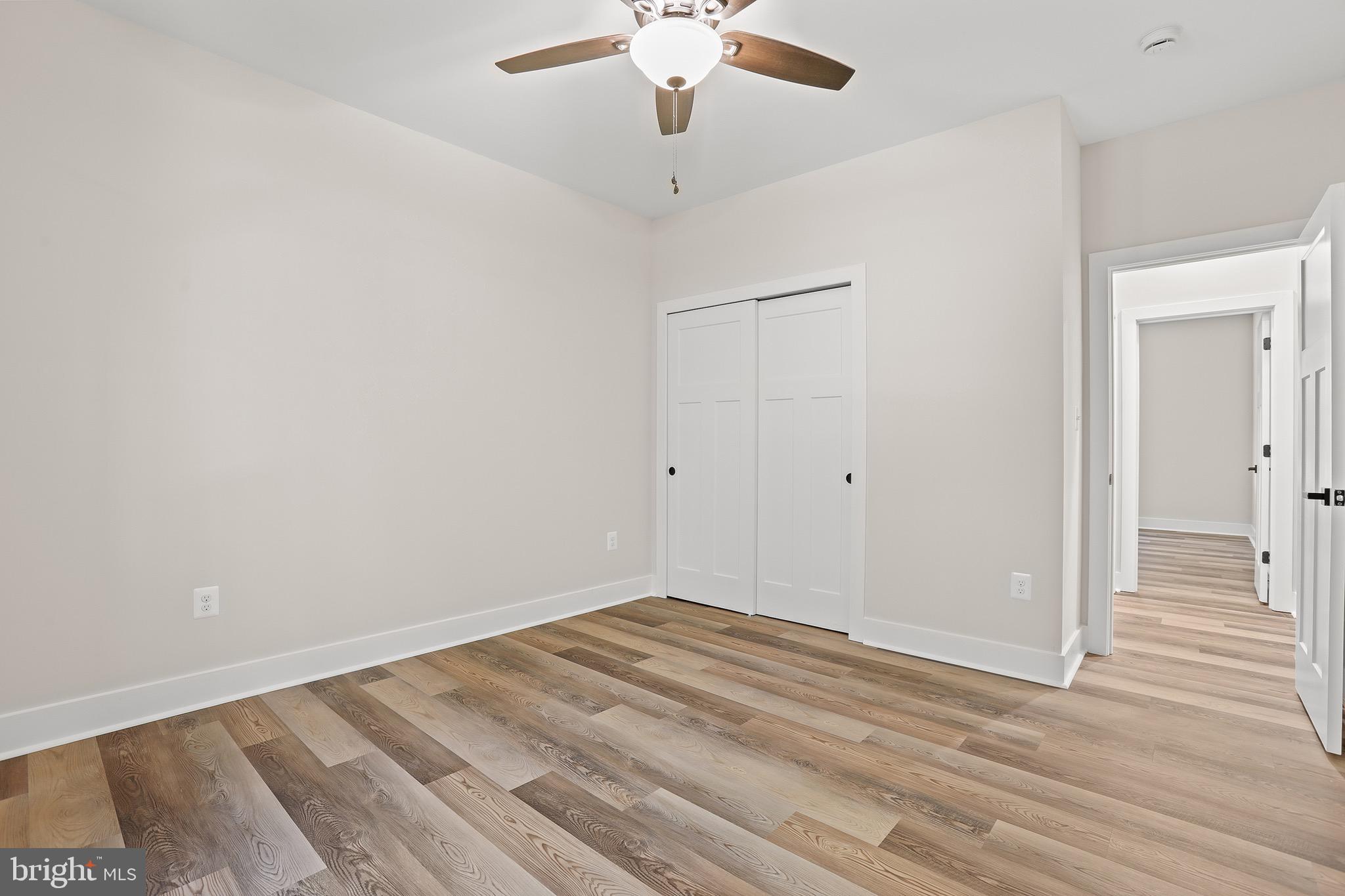 195 North Glebe Road Montross, VA 22520 - Photo 30 of 53 a view of a room with wooden floor and a ceiling fan