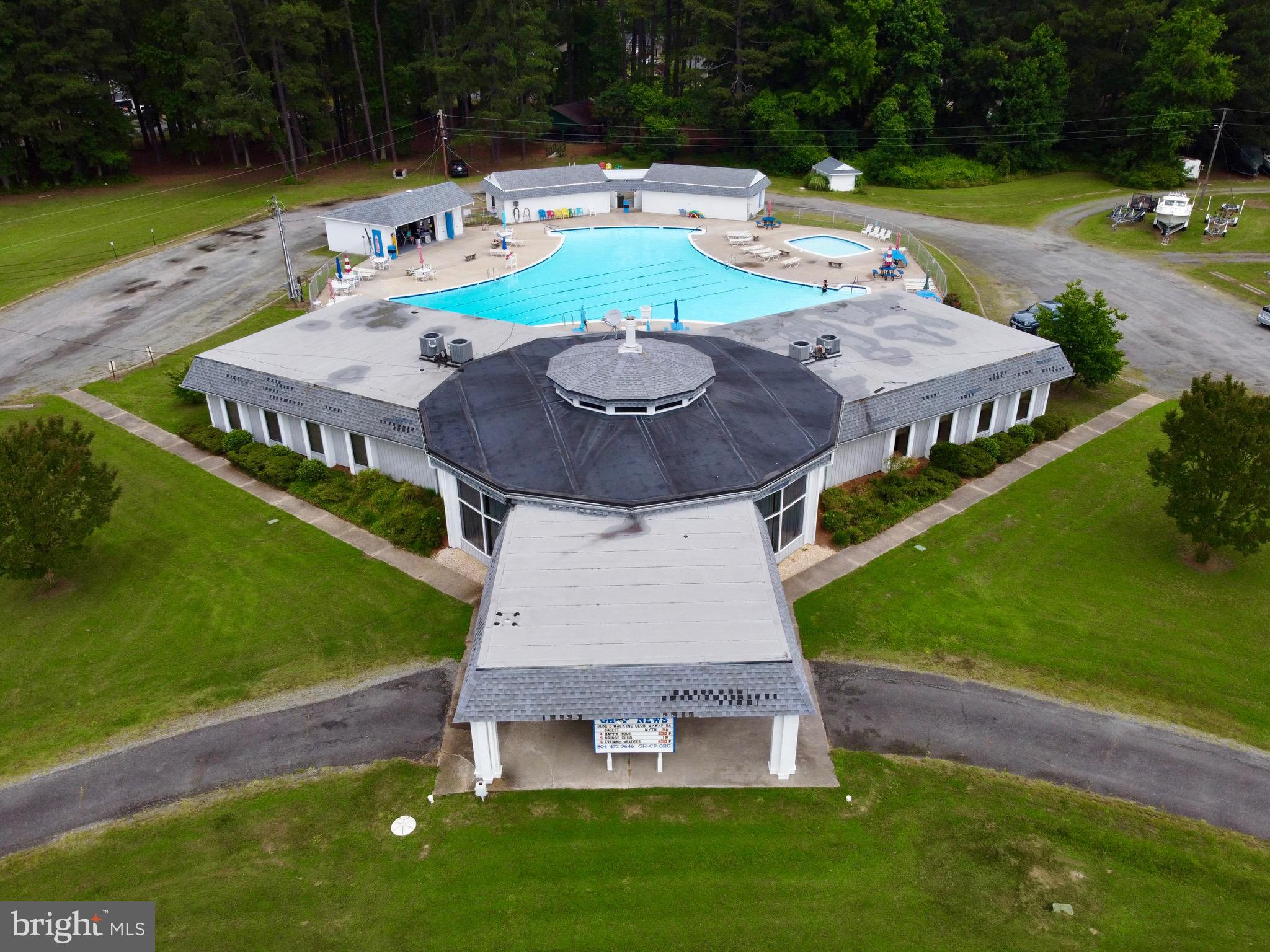 195 North Glebe Road Montross, VA 22520 - Photo 40 of 53 an aerial view of a house with swimming pool garden and outdoor seating