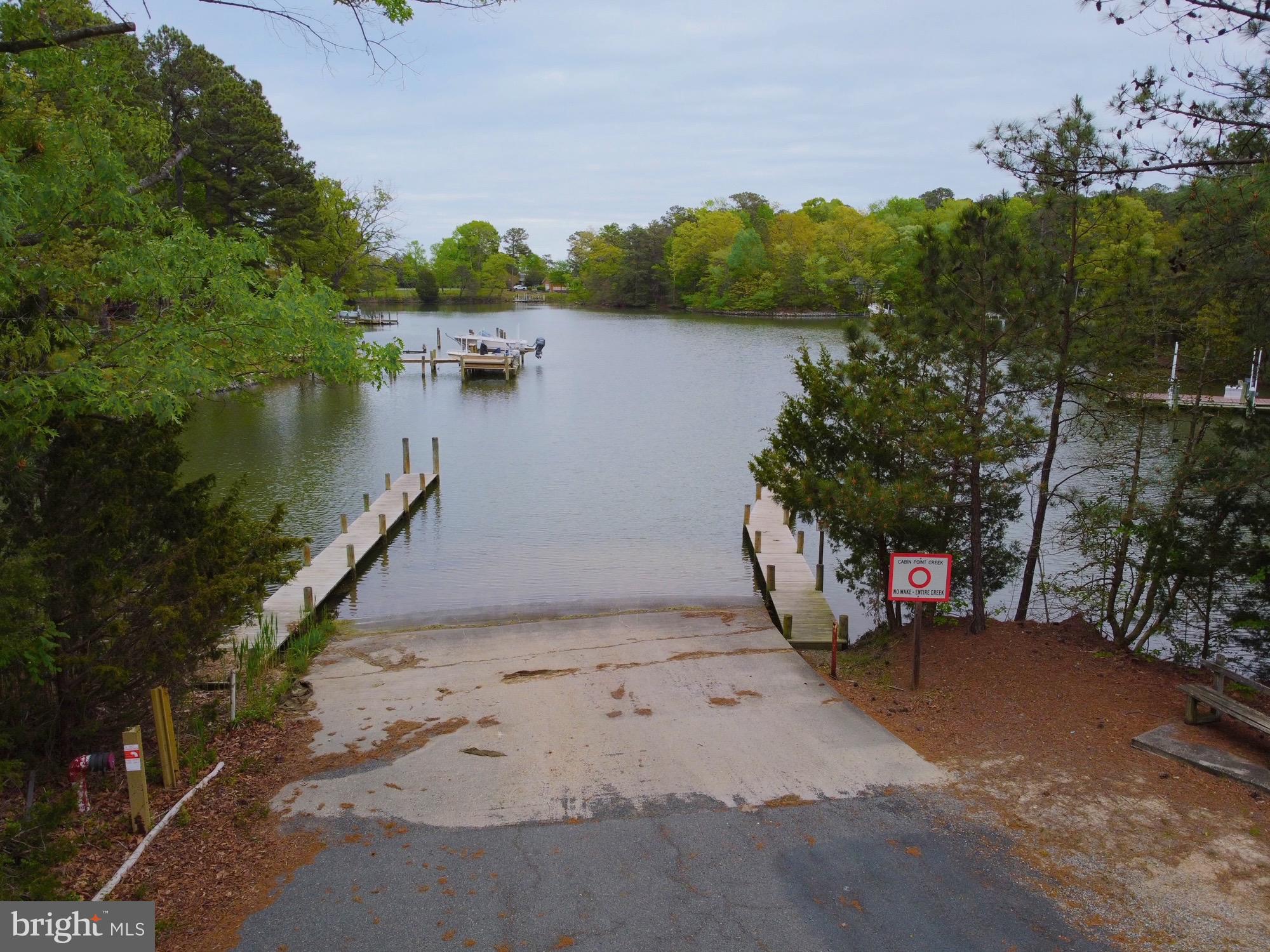 195 North Glebe Road Montross, VA 22520 - Photo 46 of 53 a view of a lake with houses