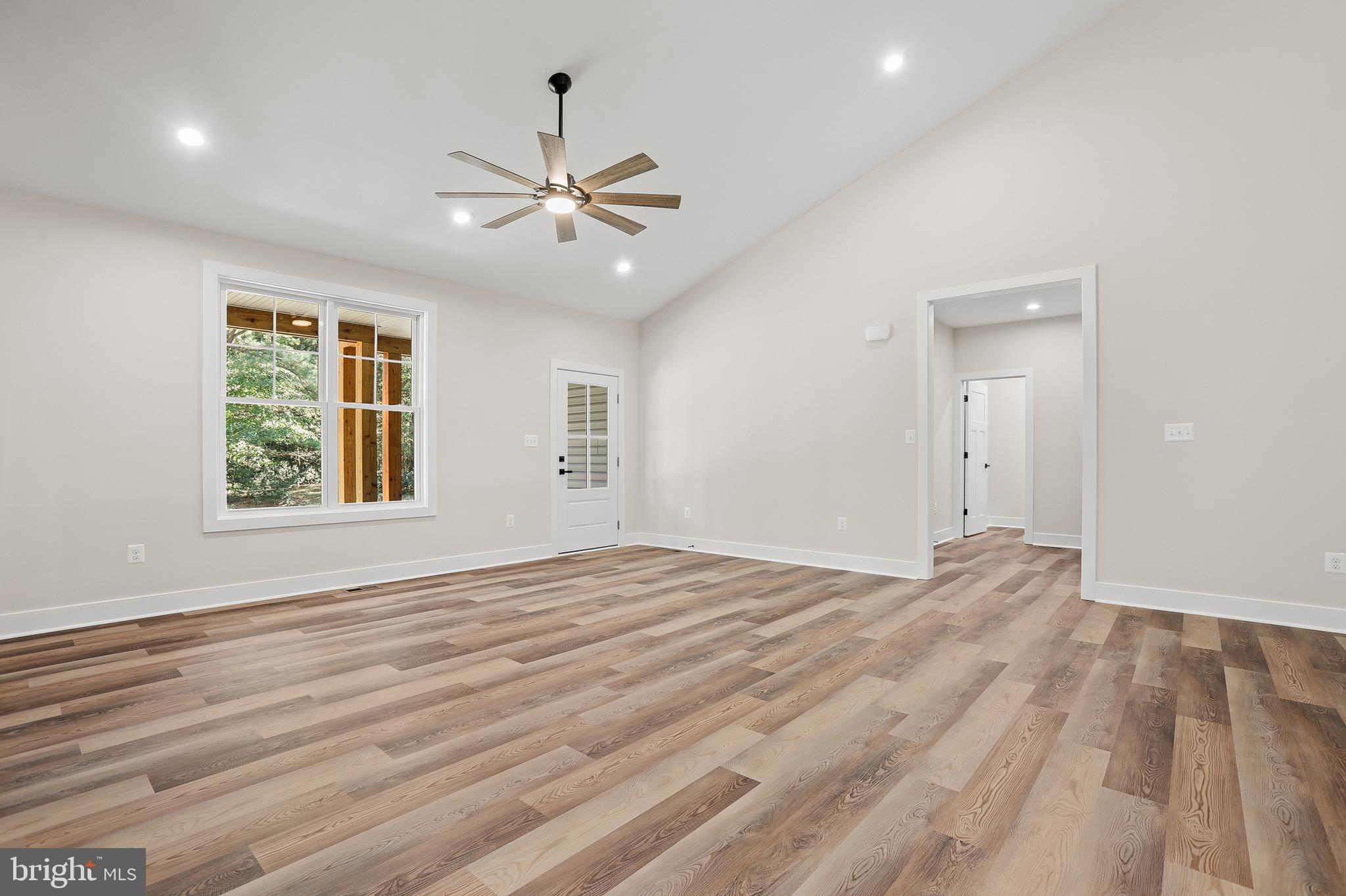 195 North Glebe Road Montross, VA 22520 - Photo 10 of 53 a view of empty room with wooden floor and fan