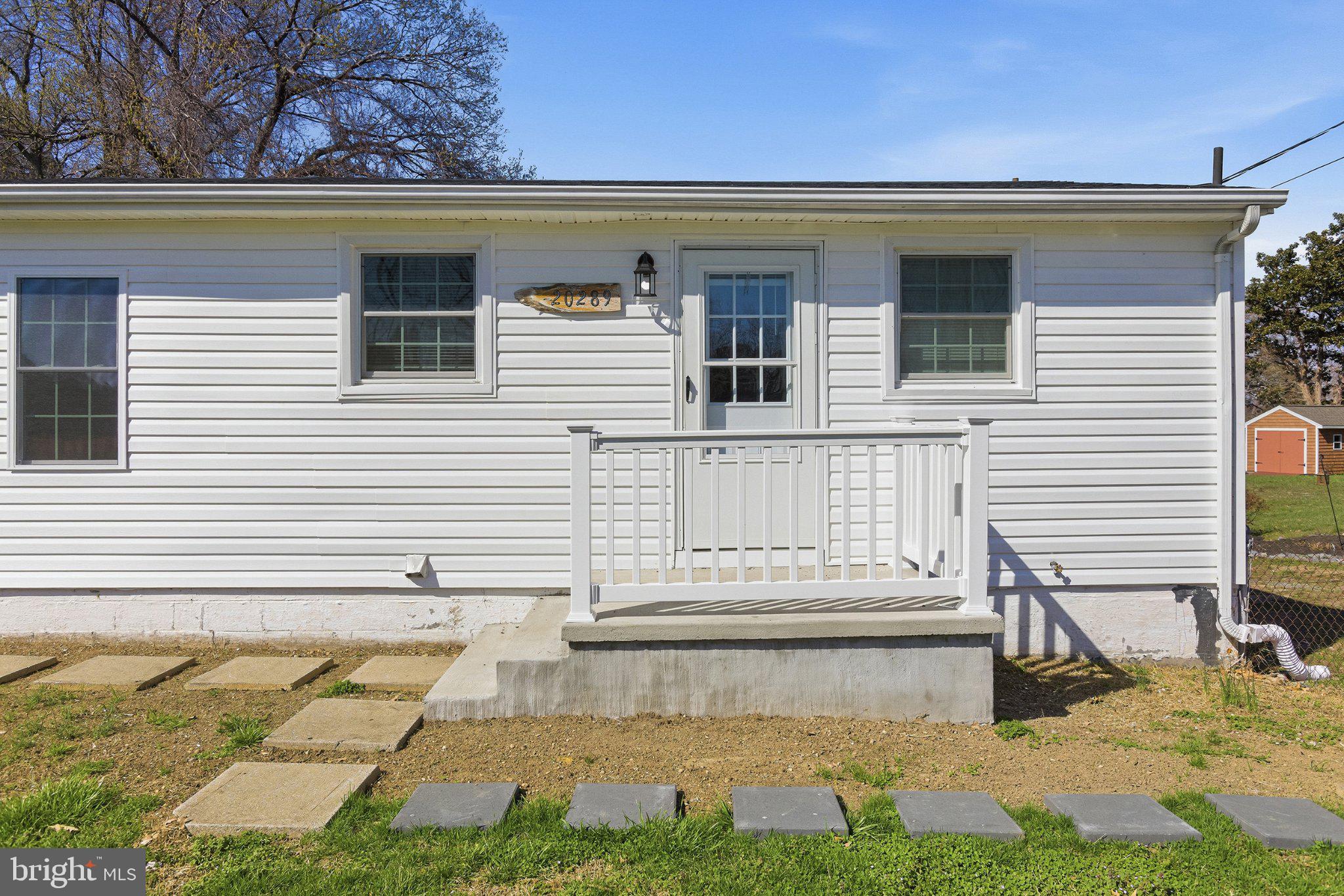 Charming entryway with modern appeal.