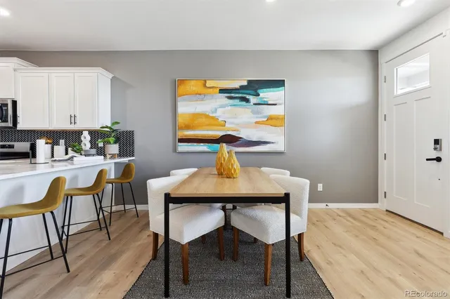 a workspace with furniture and window