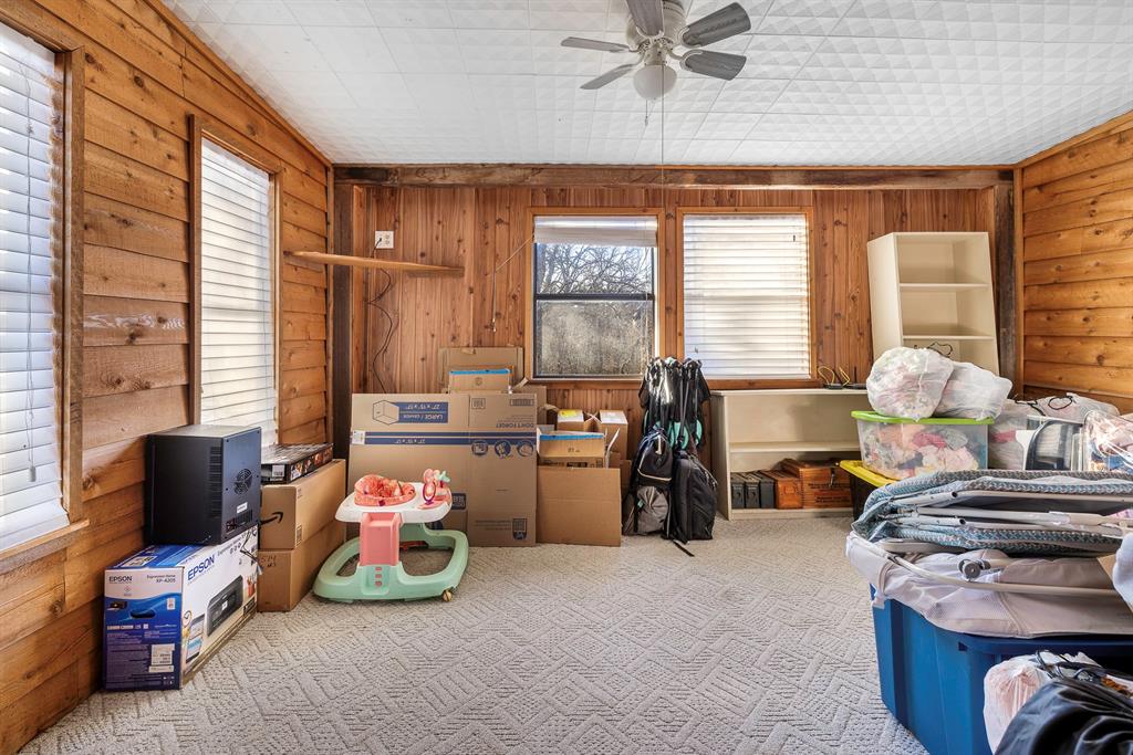 401 Sandy Lane Dublin, TX 76446 - Photo 19 of 39 a bedroom with furniture and a window