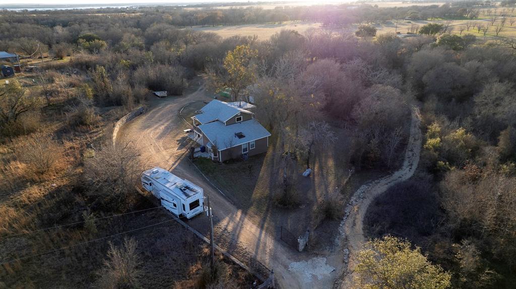 401 Sandy Lane Dublin, TX 76446 - Photo 36 of 39 an aerial view of a house with a yard