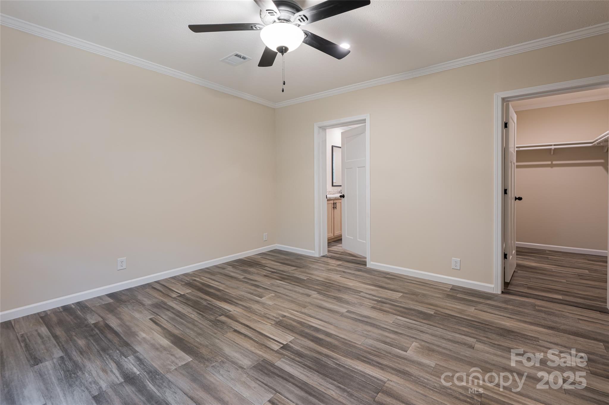 321 Flat Creek Road Black Mountain, NC 28711 - Photo 21 of 44 a view of an empty room with wooden floor